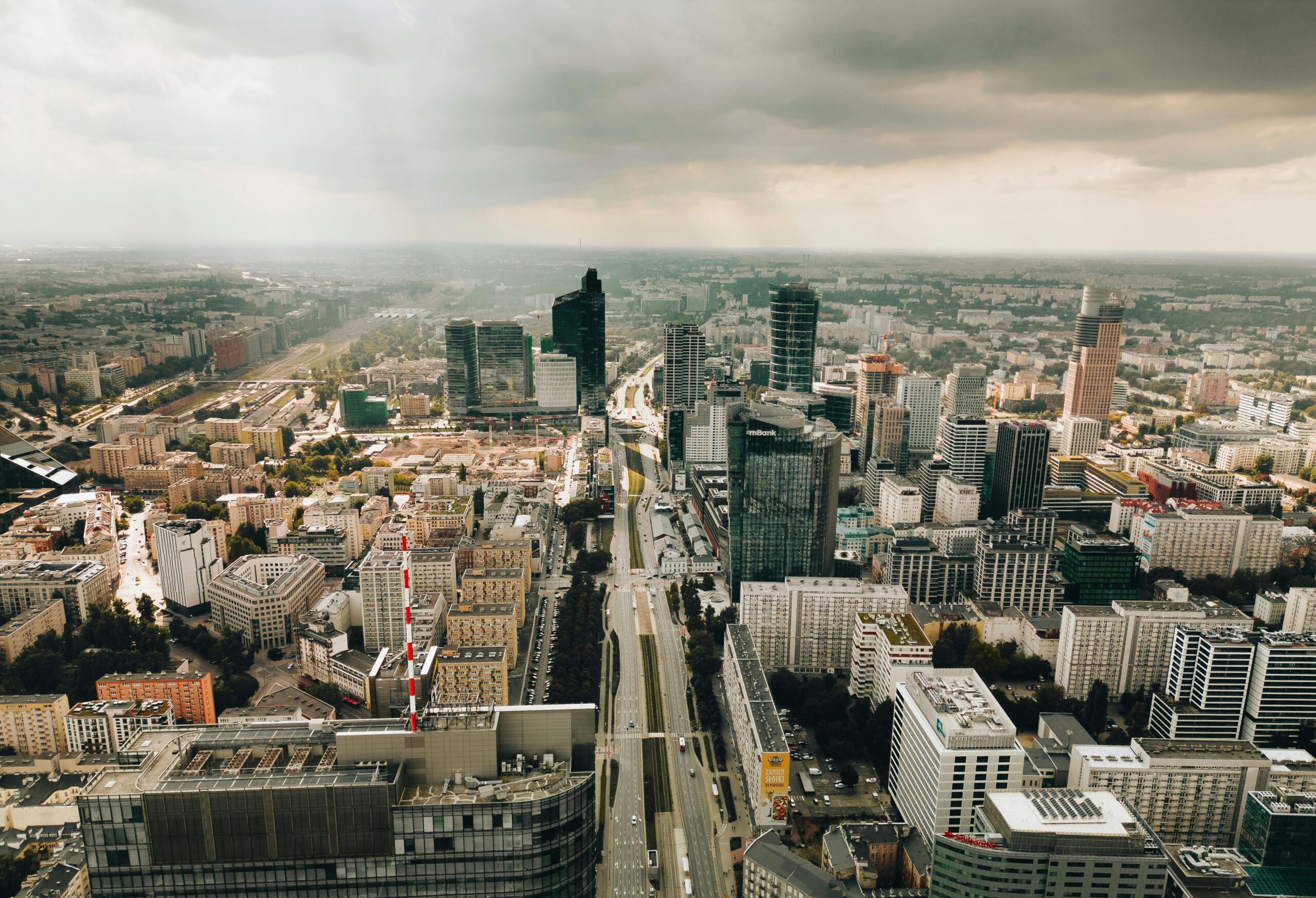 Stunning aerial photograph of Warsaw's modern skyline featuring skyscrapers and urban landscape.